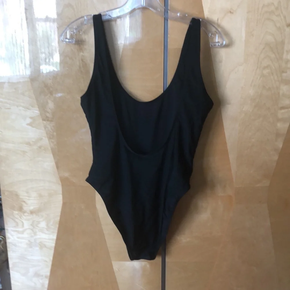 SLAY  one piece black and gold swimsuit